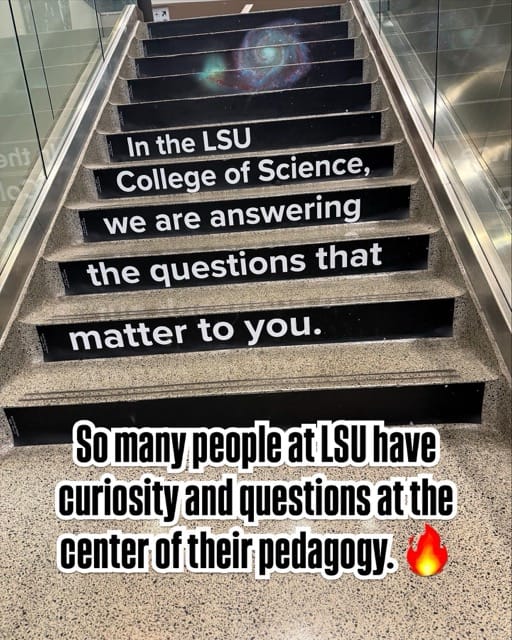 Staircase with words on it about the LSU college of Science - "we are answering the questions that matter to you"